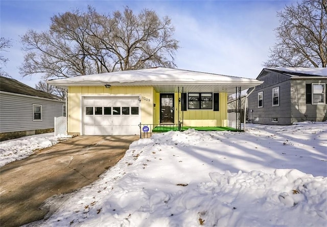 single story home featuring a garage