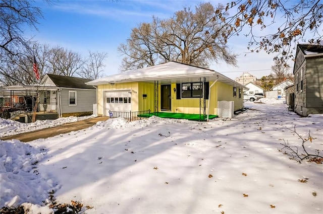 view of front of property featuring a garage