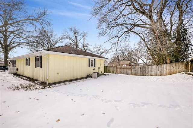 view of snow covered property