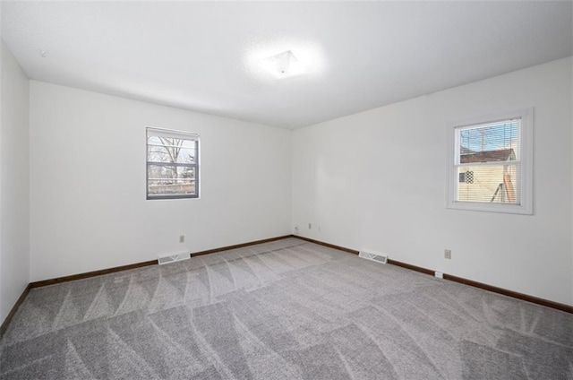 view of carpeted spare room