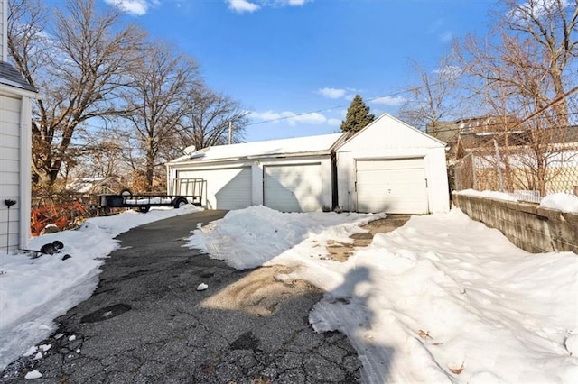 view of snow covered garage