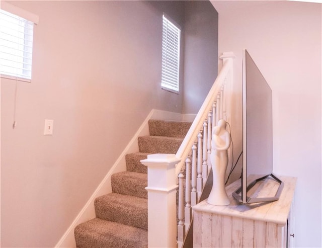 stairs featuring a wealth of natural light