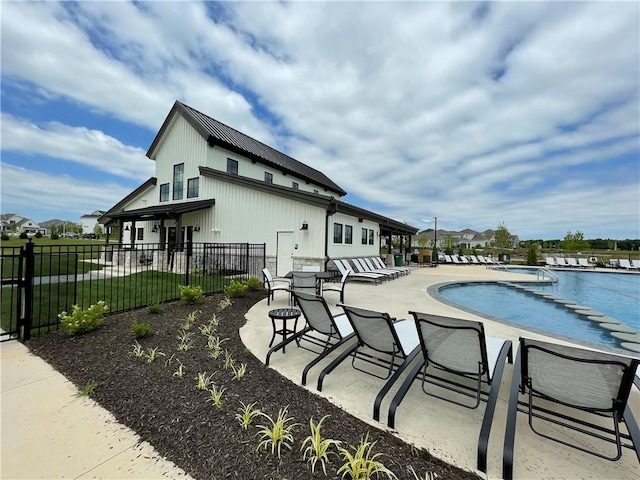 exterior space with a patio and fence