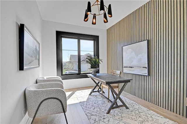 16920 Parkhill St, Overland Park, KS 66221 - office featuring an accent wall, a chandelier, wood finished floors, wallpapered walls, and baseboards