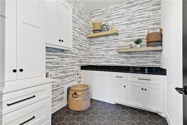 16920 Parkhill St, Overland Park, KS 66221 - kitchen with open shelves, dark tile patterned flooring, white cabinets, and dark countertops