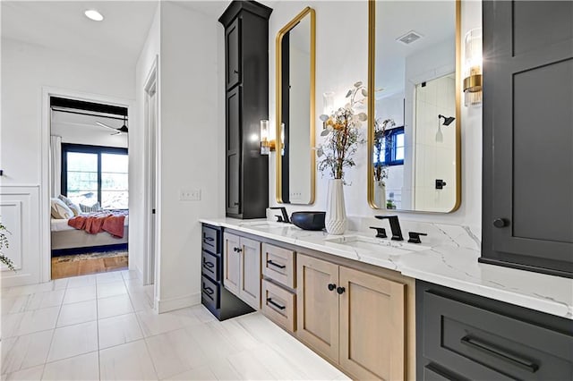 16920 Parkhill St, Overland Park, KS 66221 - full bath featuring ensuite bath, double vanity, tile patterned flooring, and baseboards