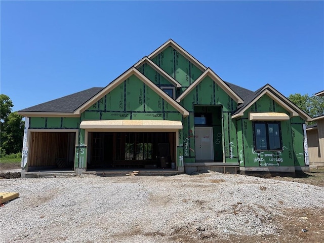 16920 Parkhill St, Overland Park, KS 66221 - property in mid-construction featuring an attached garage and driveway