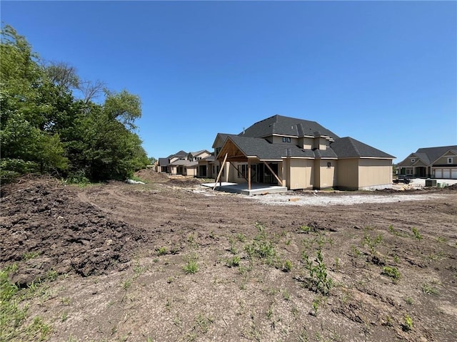 16920 Parkhill St, Overland Park, KS 66221 - back of property with a patio