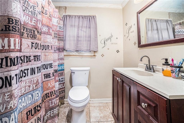 bathroom with crown molding, vanity, toilet, and tile patterned flooring