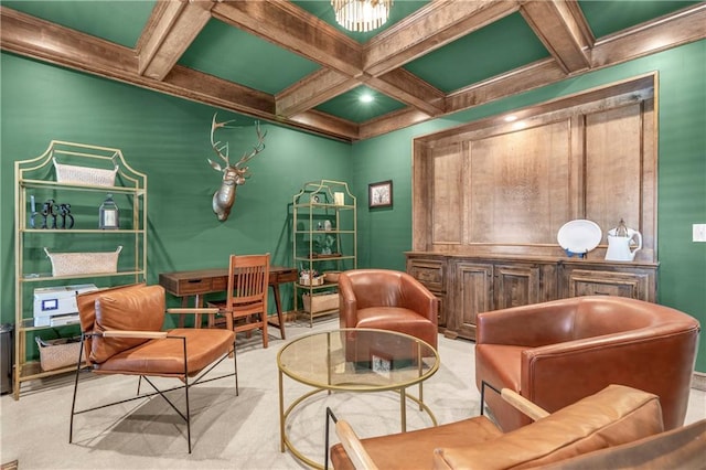 sitting room featuring beamed ceiling and coffered ceiling