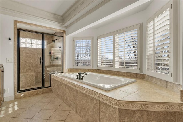 bathroom featuring independent shower and bath, ornamental molding, and tile patterned floors