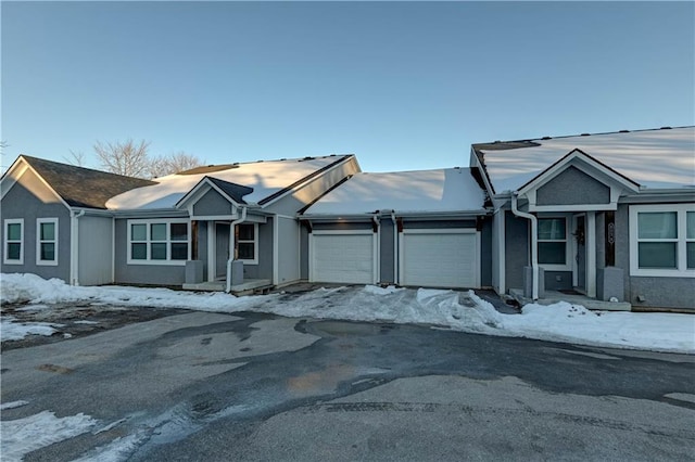 single story home with a garage