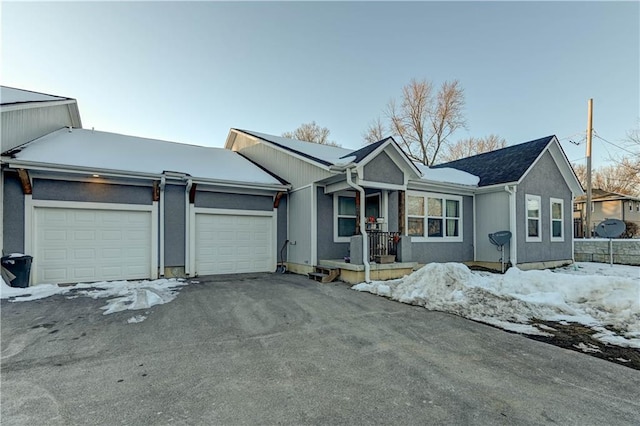 ranch-style house featuring a garage