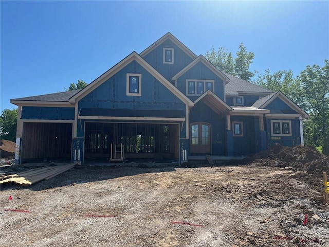 17028 Parkhill St, Overland Park, KS 66221 - view of front facade with french doors and an attached garage