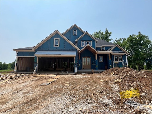17028 Parkhill St, Overland Park, KS 66221 - property under construction featuring an attached garage and french doors