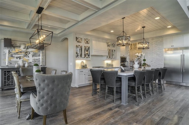 17028 Parkhill St, Overland Park, KS 66221 - dining room featuring a chandelier, dark wood-style flooring, beam ceiling, and recessed lighting