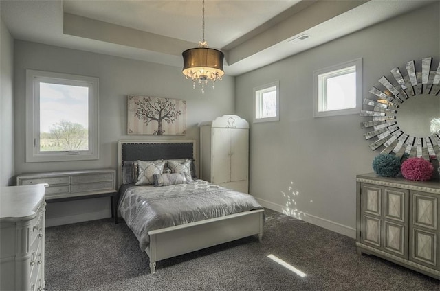 17028 Parkhill St, Overland Park, KS 66221 - bedroom featuring a chandelier, baseboards, carpet flooring, and a tray ceiling