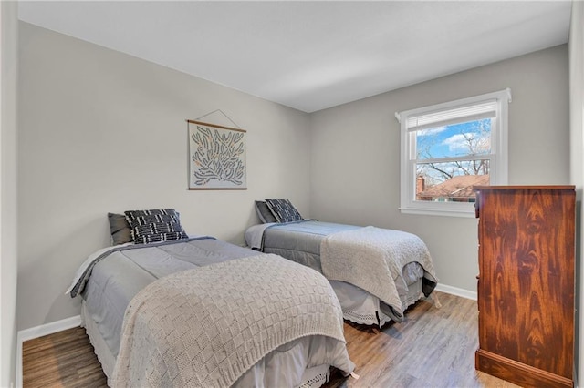 bedroom with light hardwood / wood-style floors