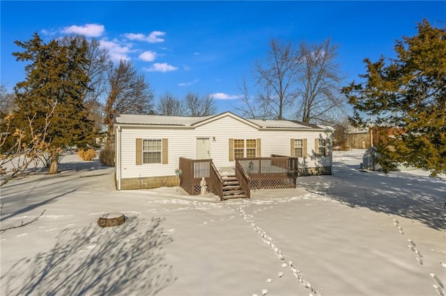 view of front of home with a wooden deck