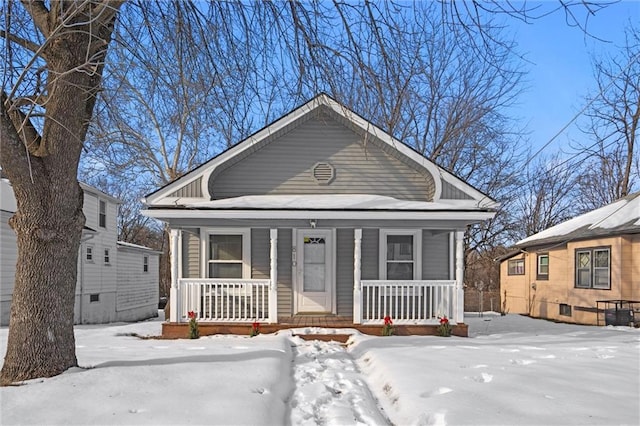 bungalow-style home featuring covered porch