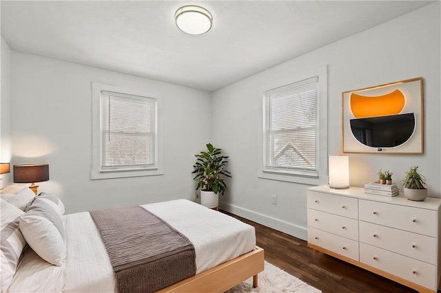 bedroom featuring dark hardwood / wood-style floors