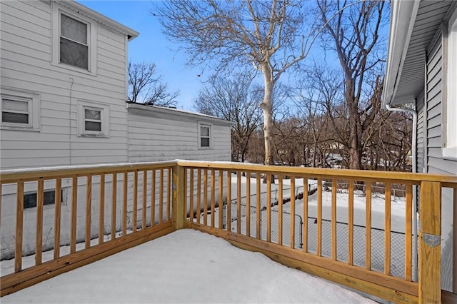 view of snow covered deck