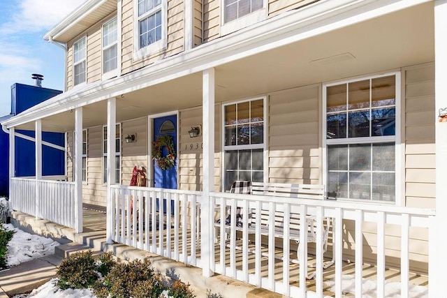 doorway to property with a porch