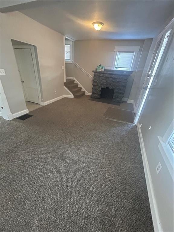 staircase with carpet floors