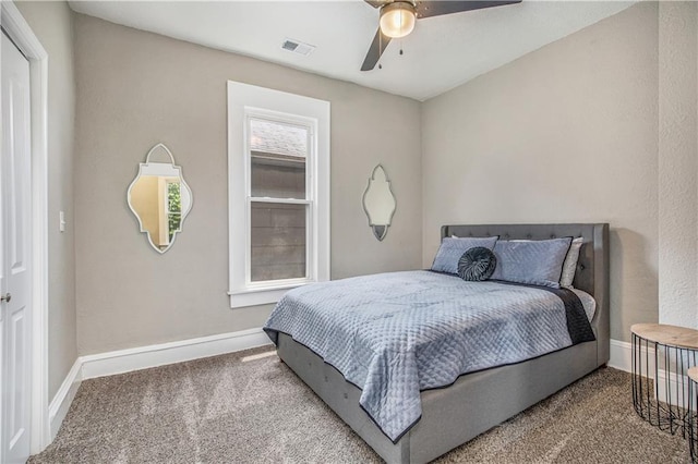 carpeted bedroom with ceiling fan