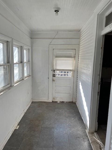 spare room featuring crown molding