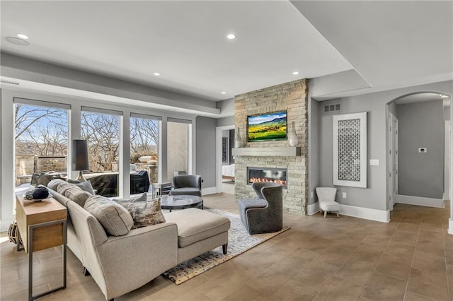 living room featuring a fireplace