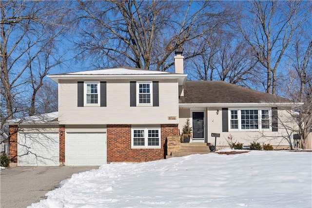 tri-level home featuring a garage