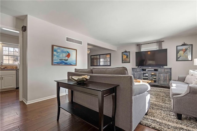 living room featuring dark hardwood / wood-style floors