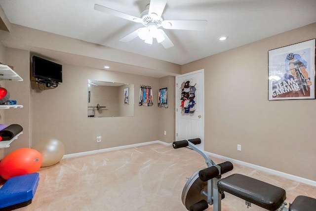 exercise area featuring carpet floors and ceiling fan