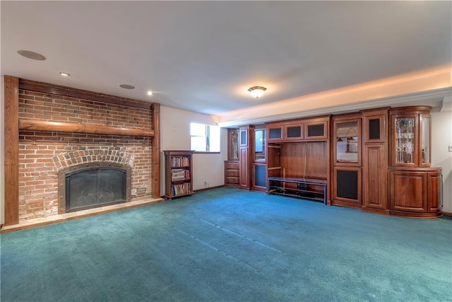 unfurnished living room featuring a fireplace and dark carpet