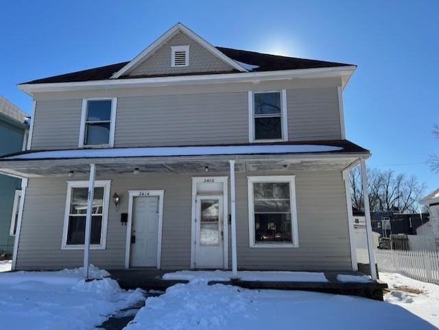 view of property with a porch