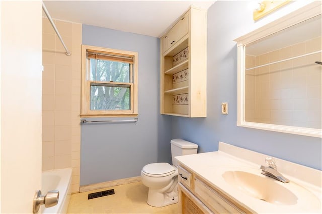 full bath with visible vents, shower / tub combination, vanity, tile patterned floors, and toilet