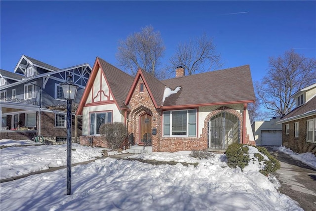 tudor house with a garage