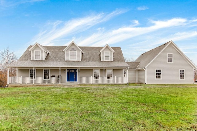 cape cod home with a front lawn and a porch