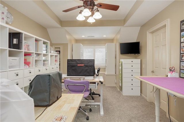 carpeted home office with ceiling fan