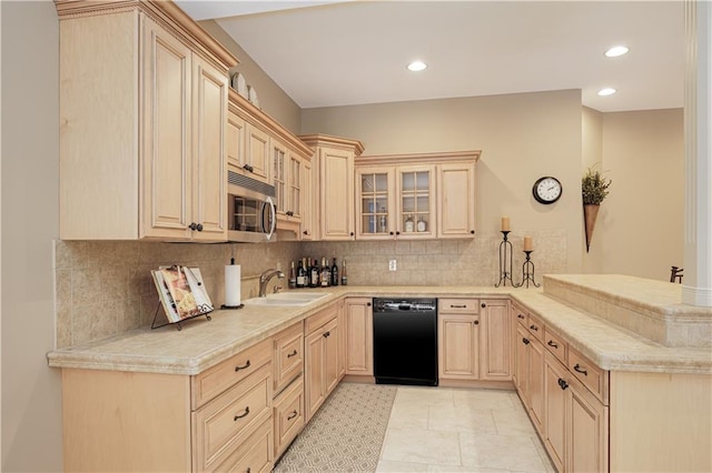 kitchen featuring dishwasher, kitchen peninsula, light brown cabinetry, decorative backsplash, and sink