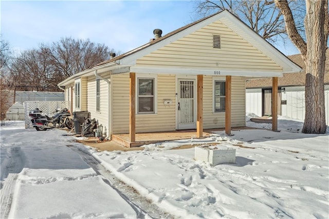 bungalow-style home featuring covered porch