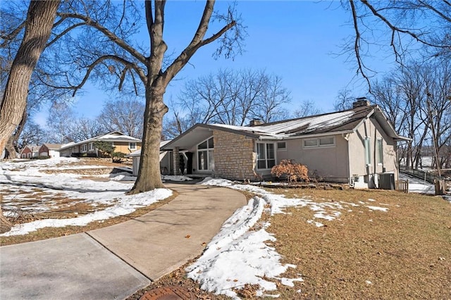 view of front of property featuring cooling unit