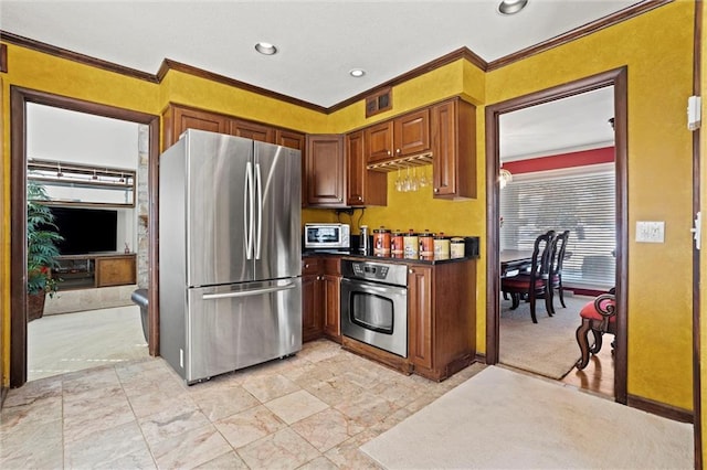 kitchen with stainless steel appliances, ornamental molding, and light carpet