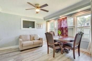 dining area featuring ceiling fan and light hardwood / wood-style flooring