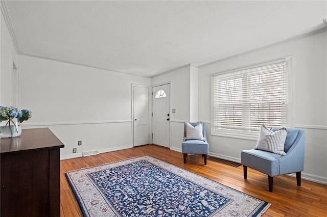 foyer entrance featuring hardwood / wood-style flooring