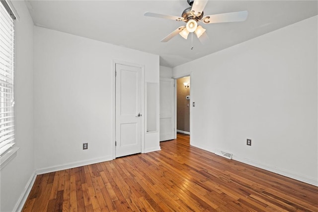 unfurnished room featuring ceiling fan and light hardwood / wood-style floors