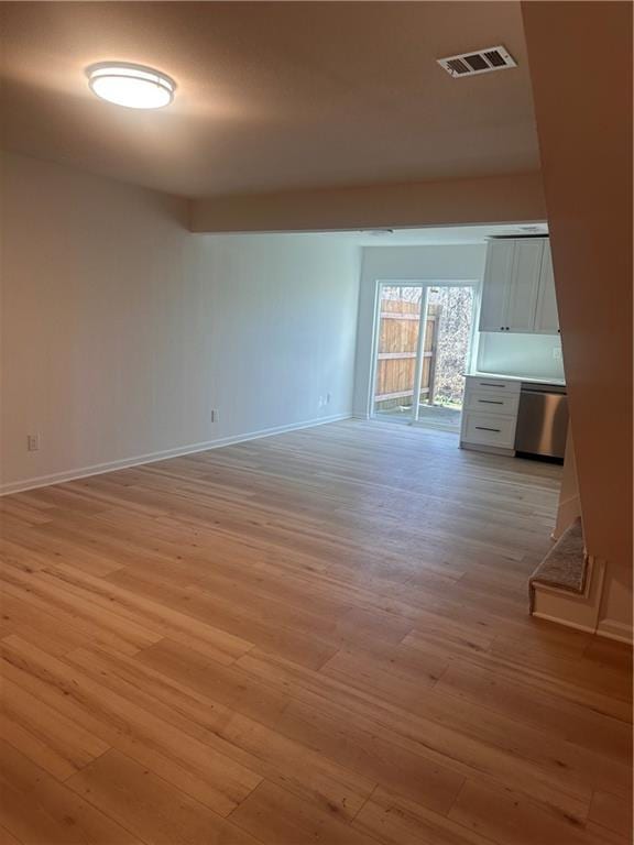 empty room with light wood-type flooring