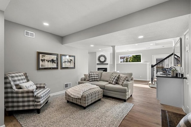 living room with hardwood / wood-style floors