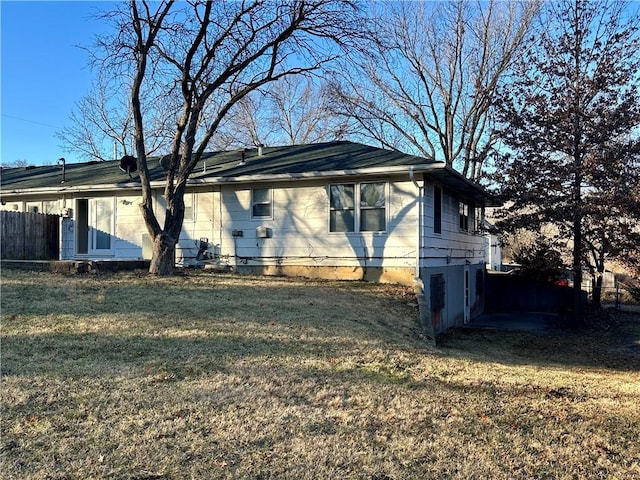 view of property exterior featuring a yard